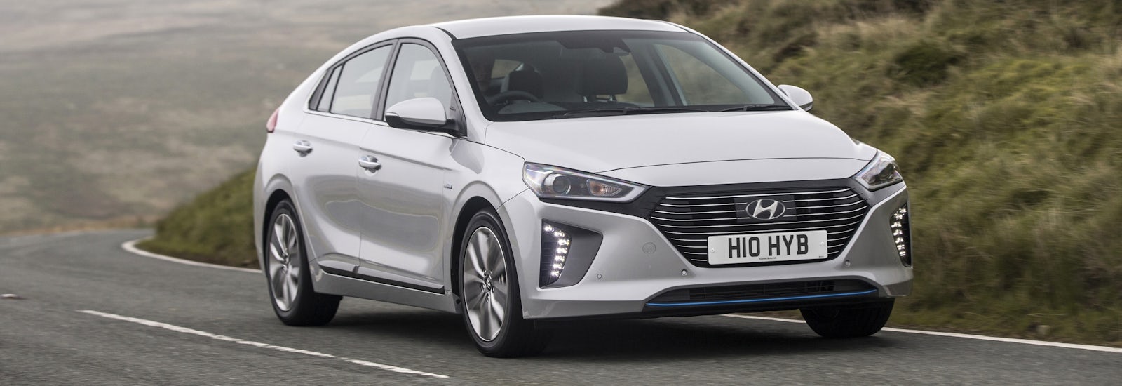 hyundai ioniq silver driving front cornering