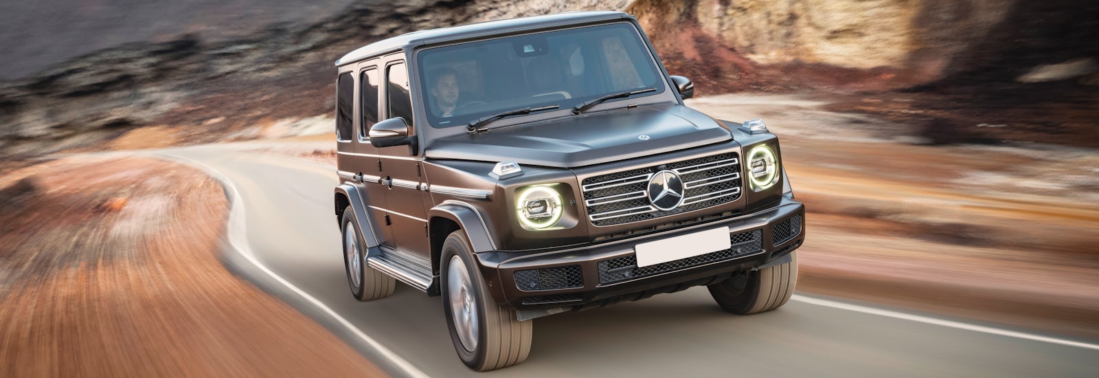 2018 mercedes g class brown driving front
